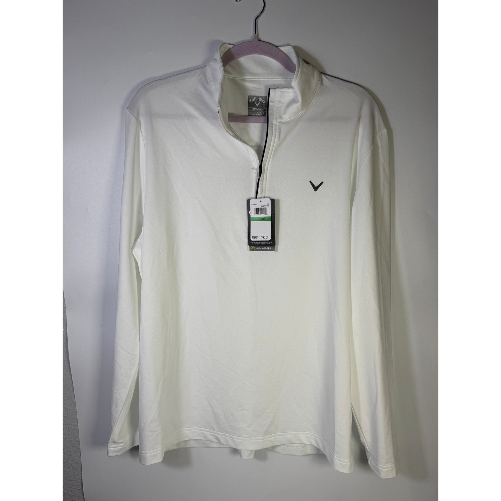 Callaway women's white Opti-Dri quarter zip golf sweatshirt, size L, showing front view with zipper detail and fabric texture.