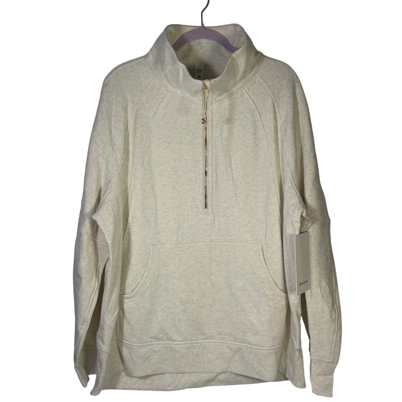Lululemon women's Heathered scuba oversized funnel neck half-zip sweatshirt in XL/XXL, showing the relaxed fit and cozy fabric.
