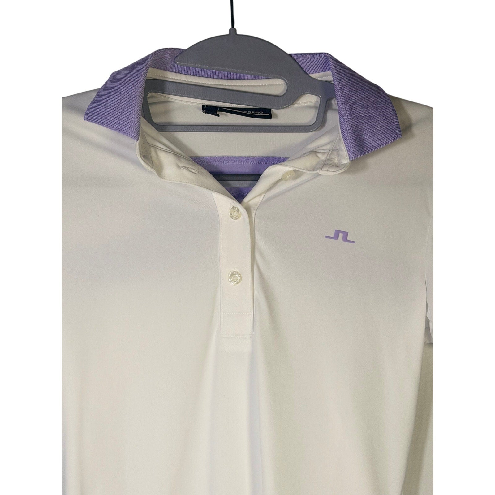 J.Lindeberg women's white and lavender golf polo shirt, short sleeve, size XS, casual athletic wear for women.