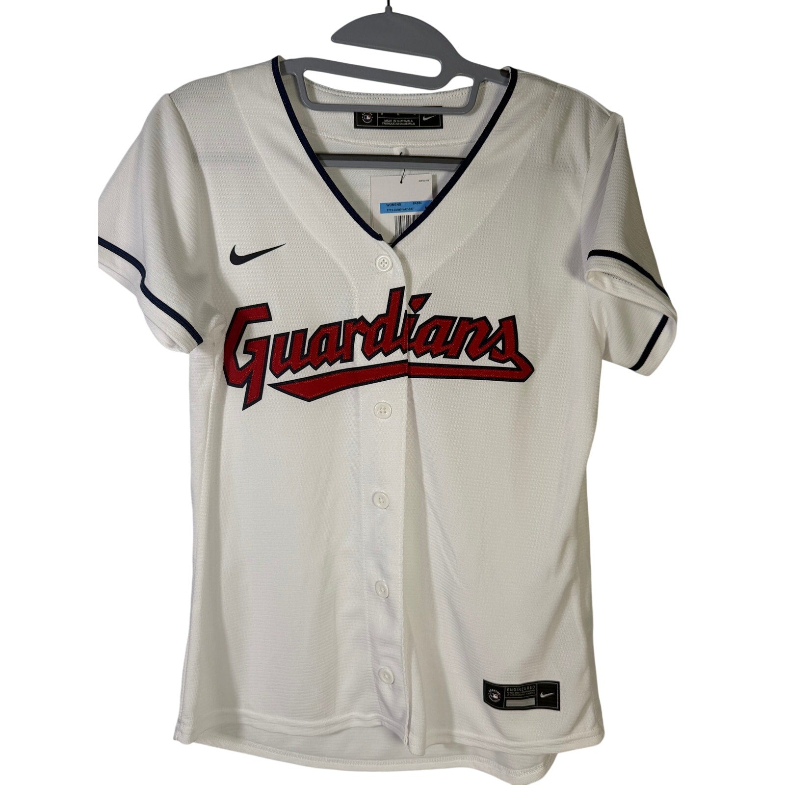 Nike Cleveland Guardians Shane Bieber #57 women's white jersey, official MLB apparel, featuring team and player details.