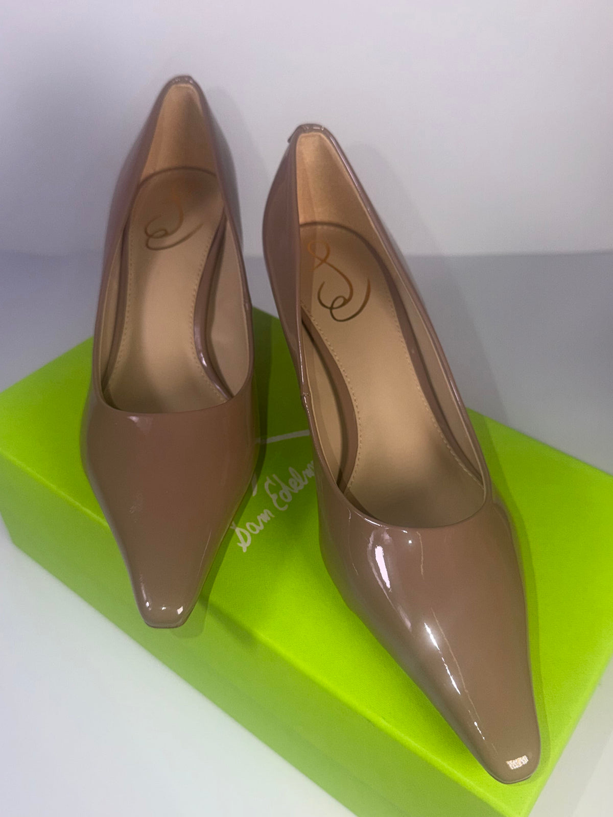 Sam Edelman Bianka patent kitten heel pumps in taupe, showing elegant design and pointed toe on a US size 7 pair.