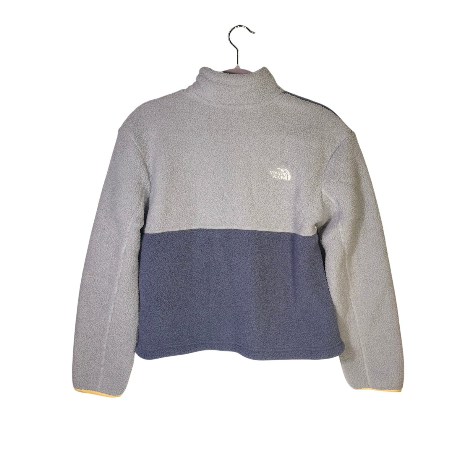 The North Face Women’s Yumiori 1/4 Zip Fleece Pullover in Twilight Galaxy, size small, displayed on a hanger.