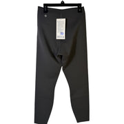 Lululemon Glow Up high-rise leggings in graphite grey, size 8, showing the fitted yoga tights with seamless design.
