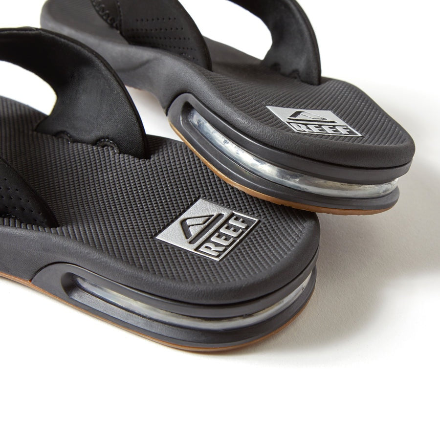 Reef Fanning men's flip-flop sandals in size 8, featuring cushioned footbed and adjustable strap for comfortable casual wear.