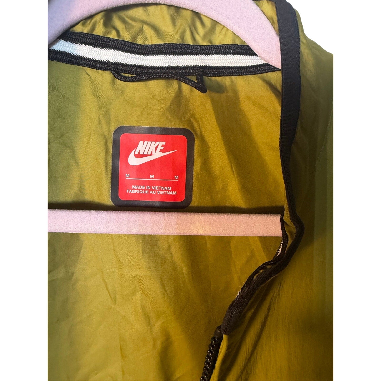 Nike Tech Woven Utility Wind Vest for men in green, full zip, lightweight and functional outdoor vest with a woven design.