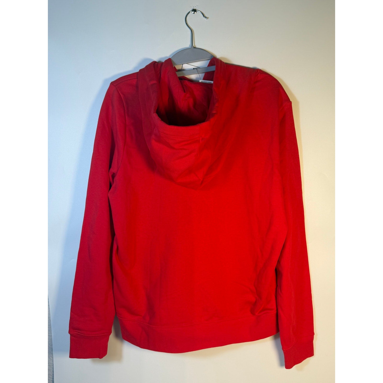 Red Nike Sportswear Club Fleece hoodie for women, medium size, featuring a comfortable pullover design and Nike branding.