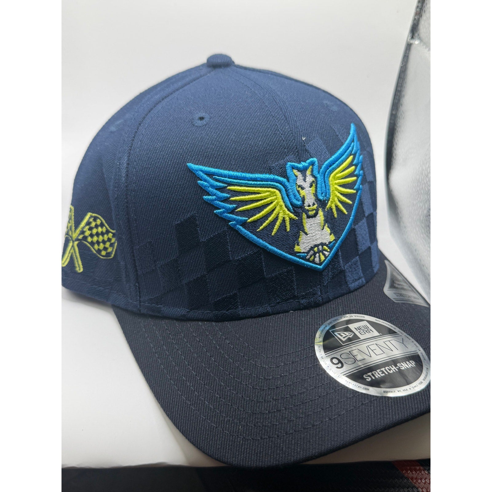New Era Dallas Wings WNBA navy stretch-snap hat, 9SEVENTY style, close-up view showing adjustable snapback closure.
