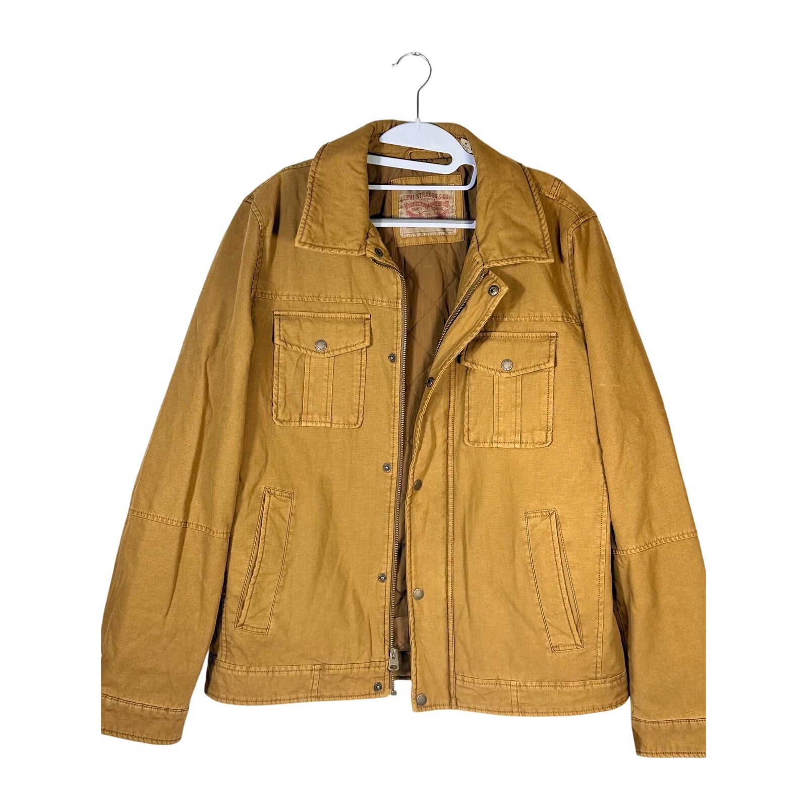 Levi’s men's tan canvas quilted utility field jacket, size medium, with multiple pockets and quilted interior, casual outdoor style.