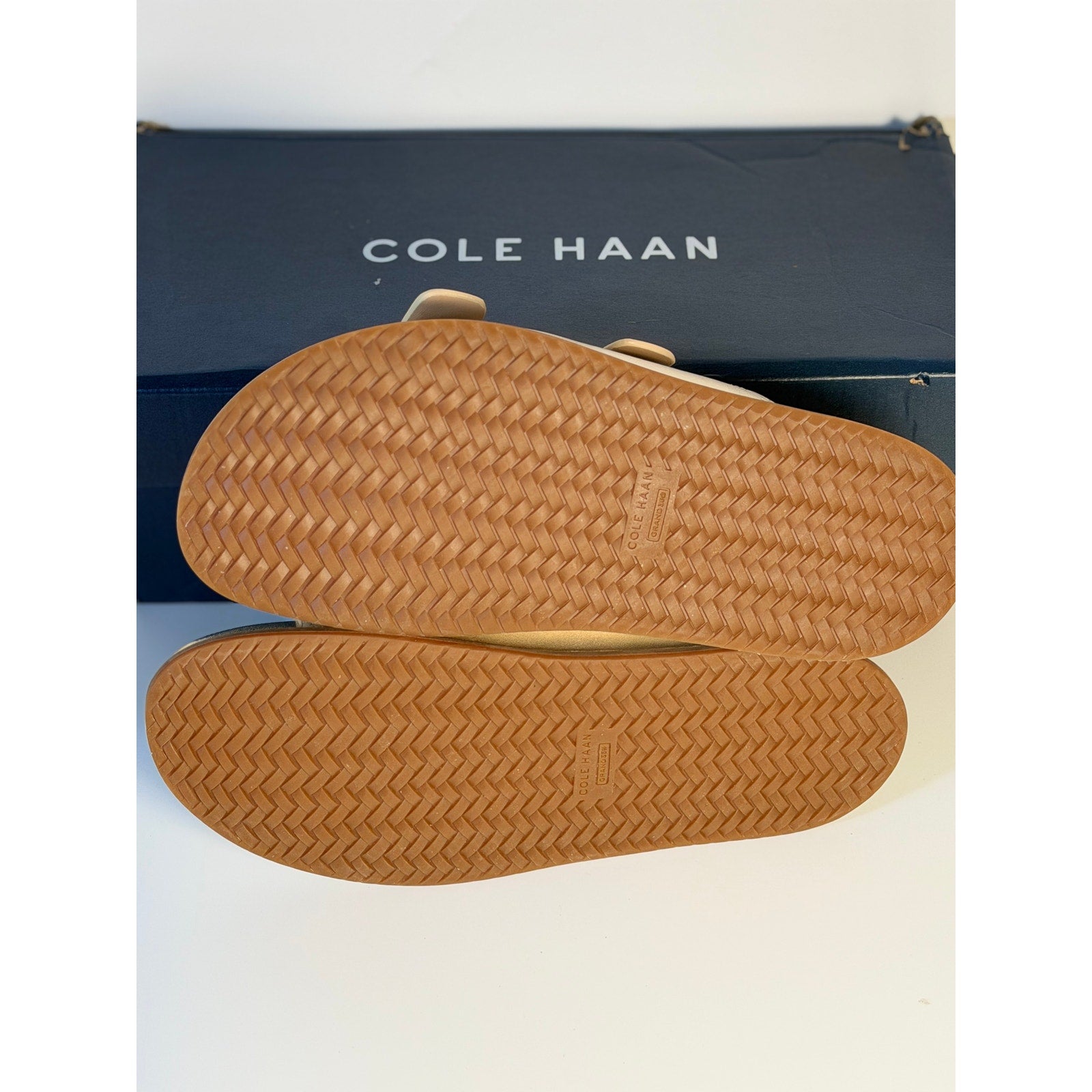 Cole Haan women's gold leather double strap footbed sandals size 7B, featuring stylish straps and a comfortable design.