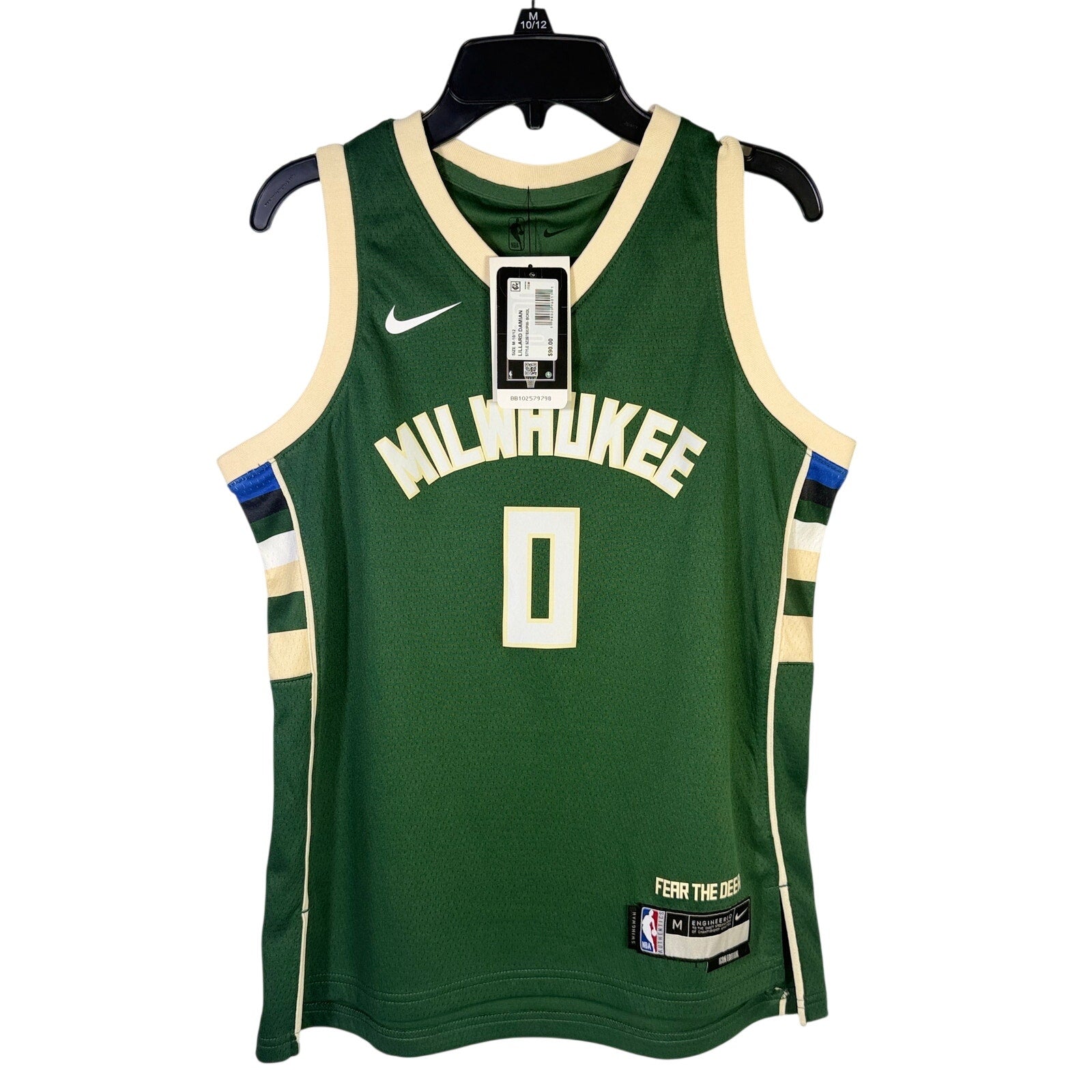 Nike Milwaukee Bucks Damian Lillard #0 youth swingman jersey in green, size M, featuring team and player details.
