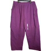 FP Movement Free People women's purple Top Score Barrel Sweatpants laid flat, showing the relaxed fit and soft fabric.