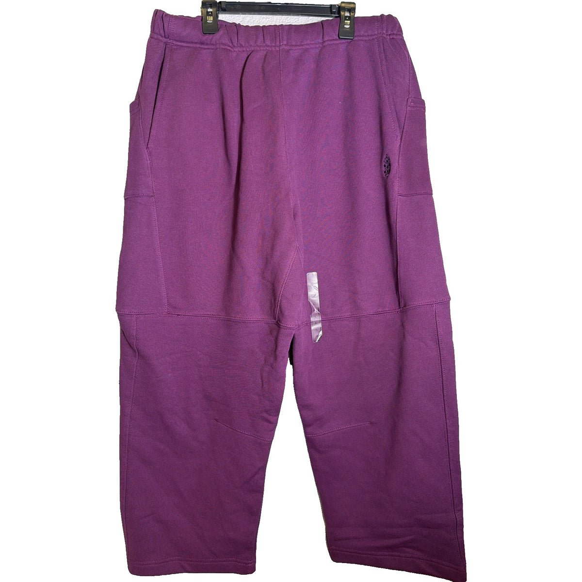 FP Movement Free People women's purple Top Score Barrel Sweatpants laid flat, showing the relaxed fit and soft fabric.