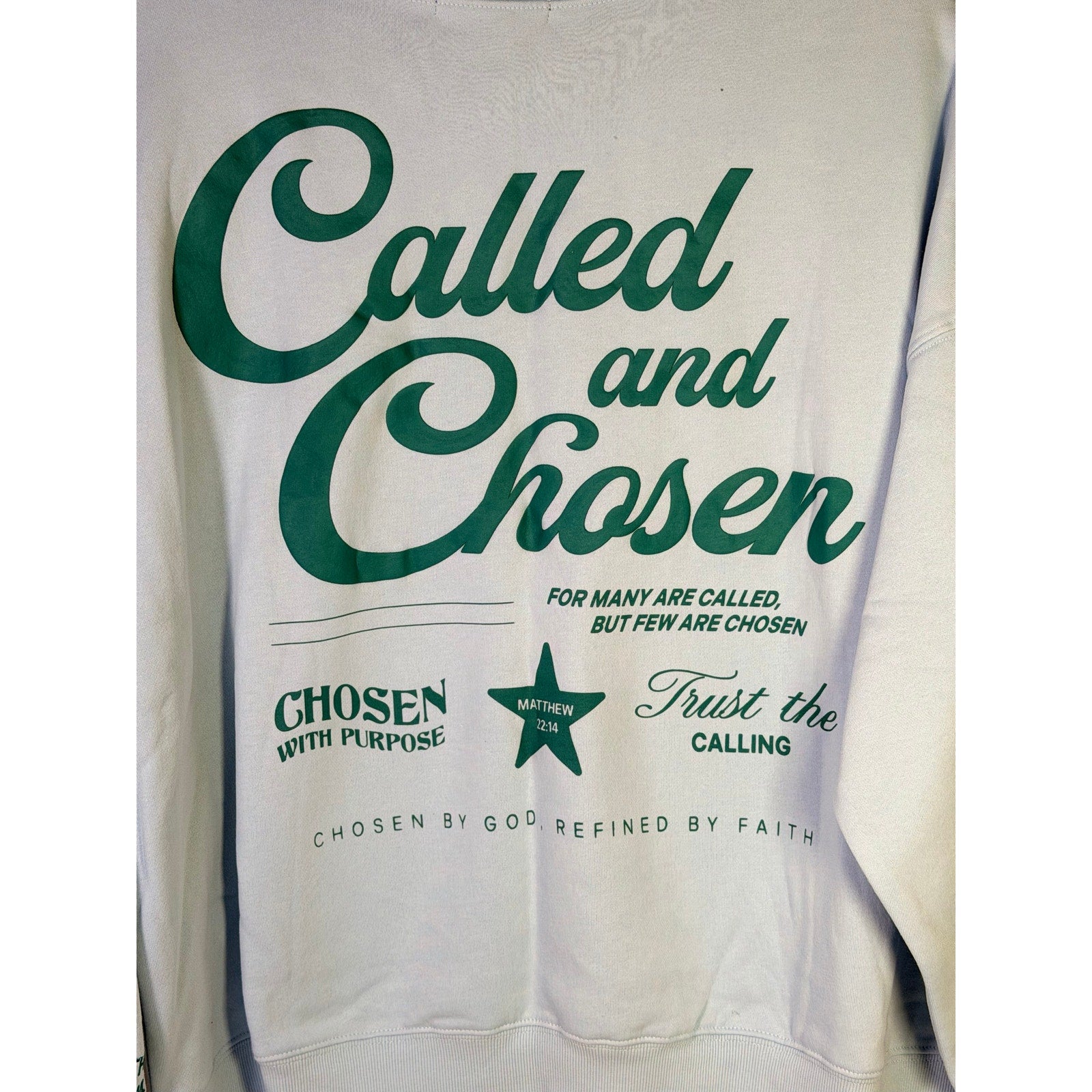Light blue Revival Club Christian sweatshirt with "Called and Chosen" graphic, size XL, new with tags.