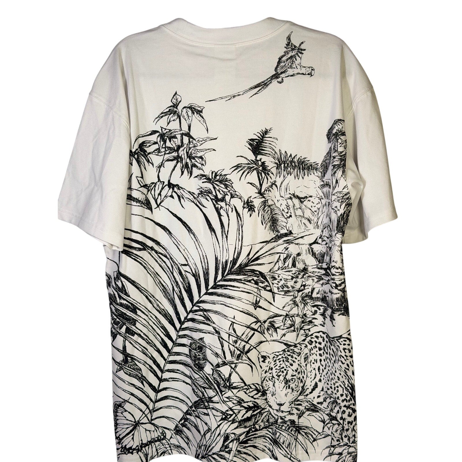 Nike ACG men's Jungle Animal graphic Dri-FIT T-shirt, small size, featuring a vibrant jungle animal print on the front.