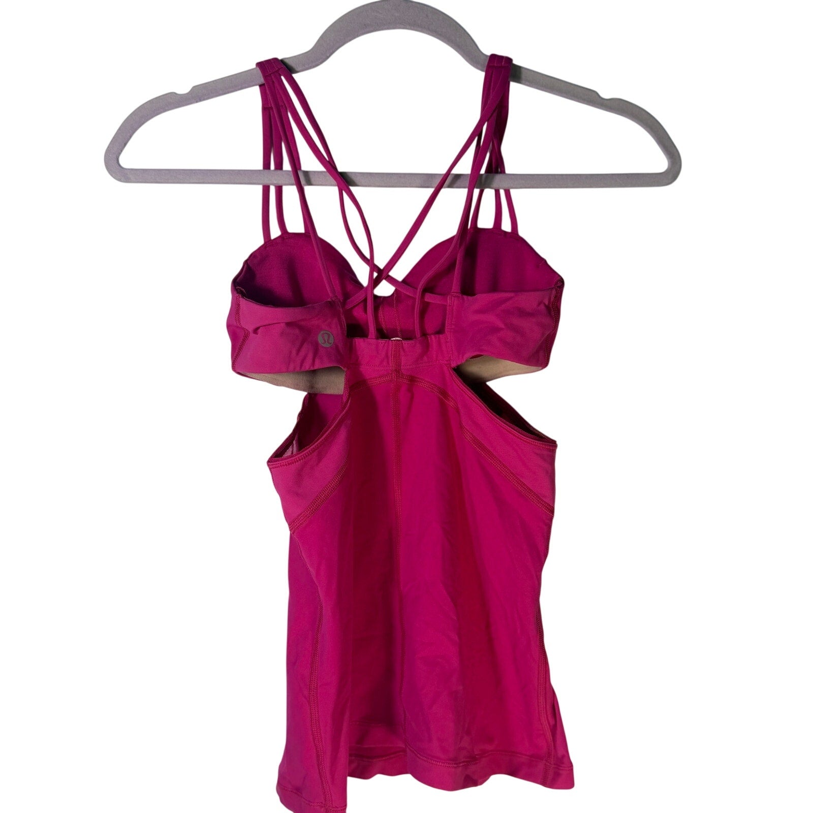Lululemon women's magenta strappy cutout athletic tank top, size 2, pre-owned, with stylish design and breathable fabric.