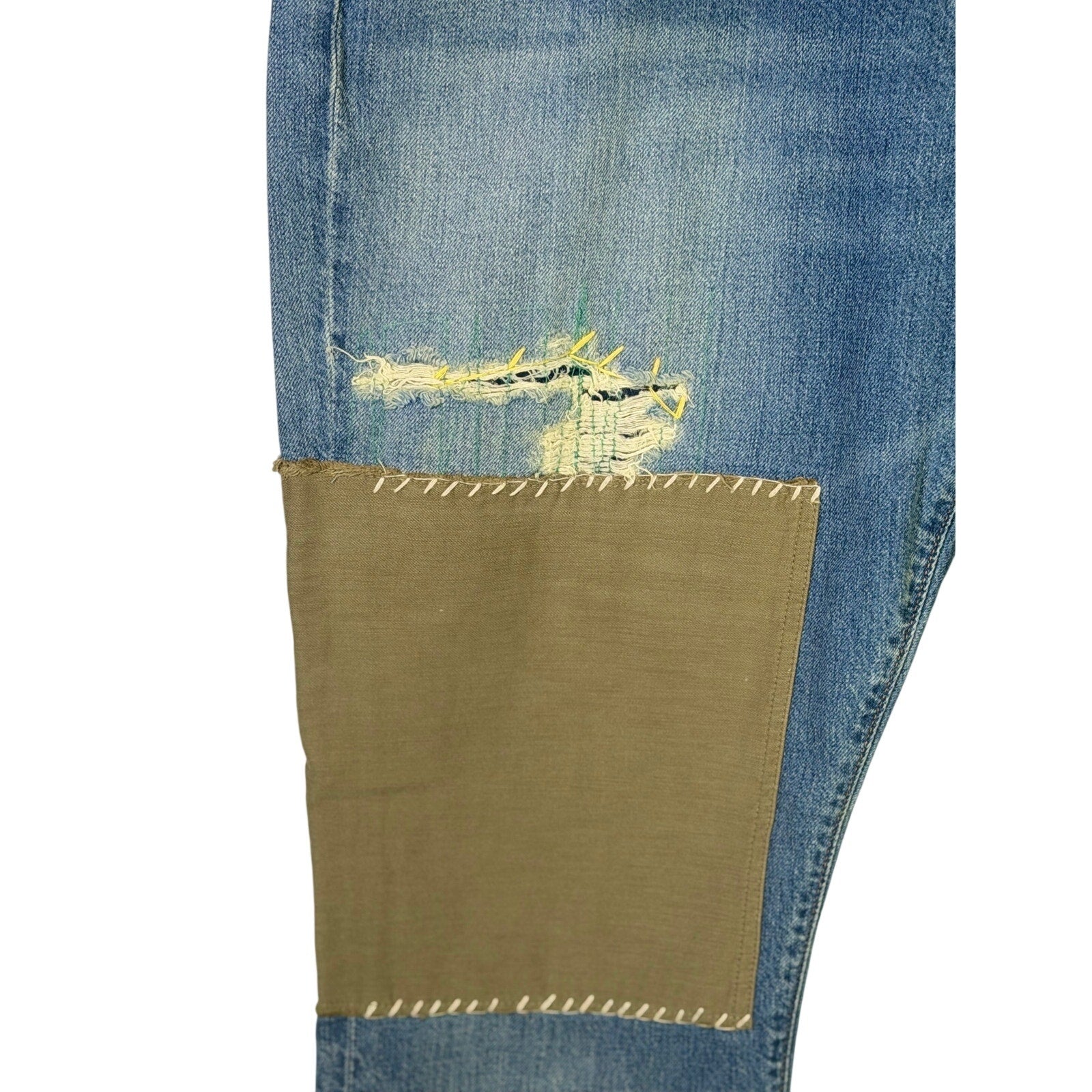 Polo Ralph Lauren men's slim boyfriend patchwork distressed jeans size 32, featuring faded denim and stylish distressed details.
