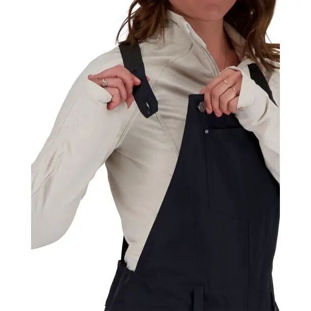 Obermeyer women's insulated ski snow bib overalls in black, size 8, showing front view with adjustable straps and waterproof fabric.