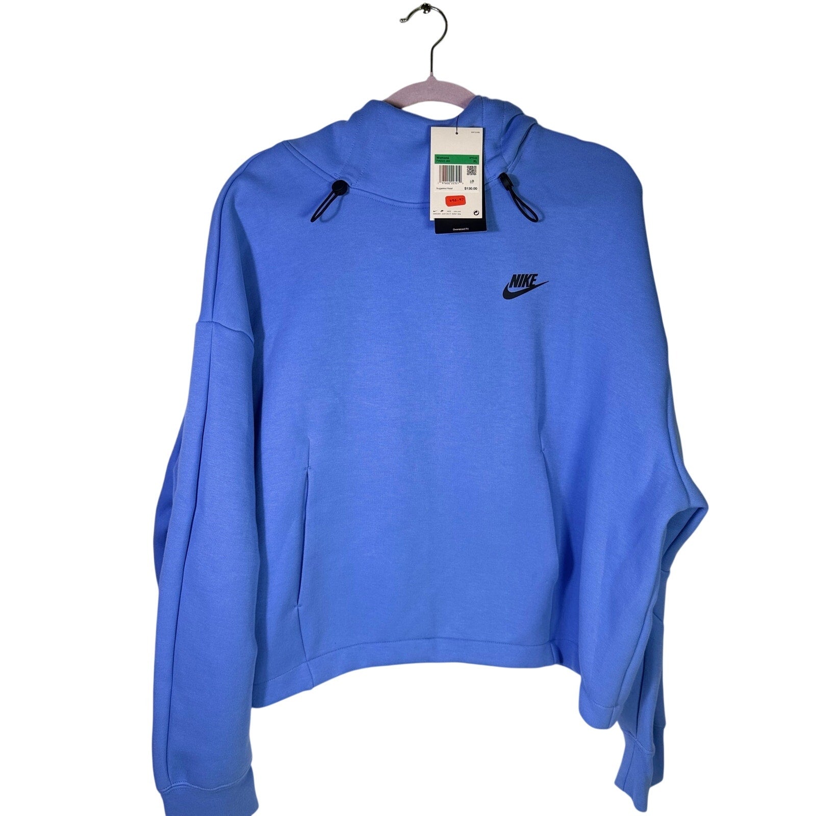 Nike Sportswear women's oversized blue fleece hoodie, size XL, soft and cozy pullover with a relaxed fit.