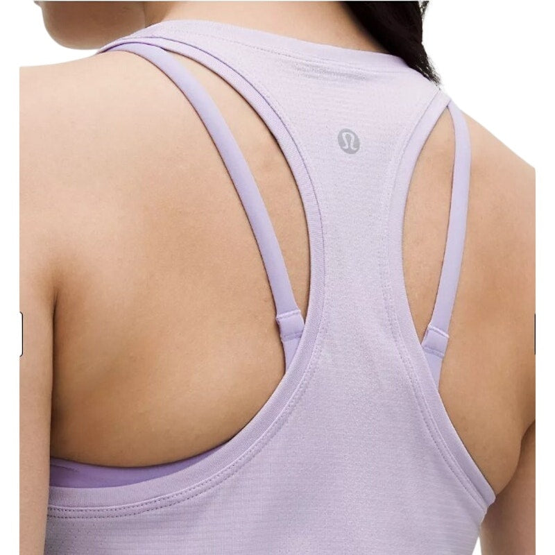 Lululemon Athletica Swiftly Tech Racerback Tank Top 2.0 in Lavender Frost, women's size 12, lightweight athletic top with racerback design.