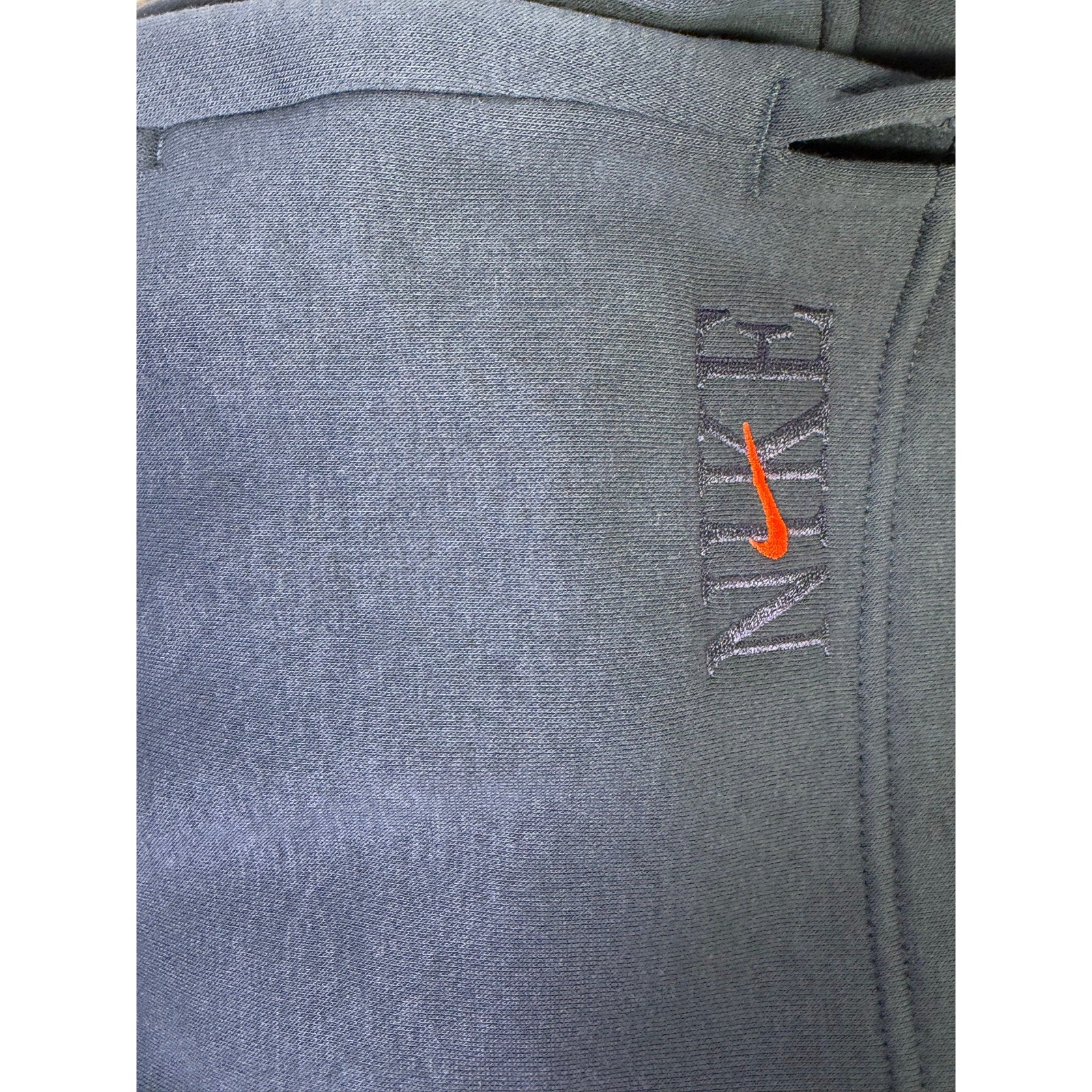 Nike women's navy blue fleece drawstring mini skirt, size M, with elastic waistband, casual and sporty style.