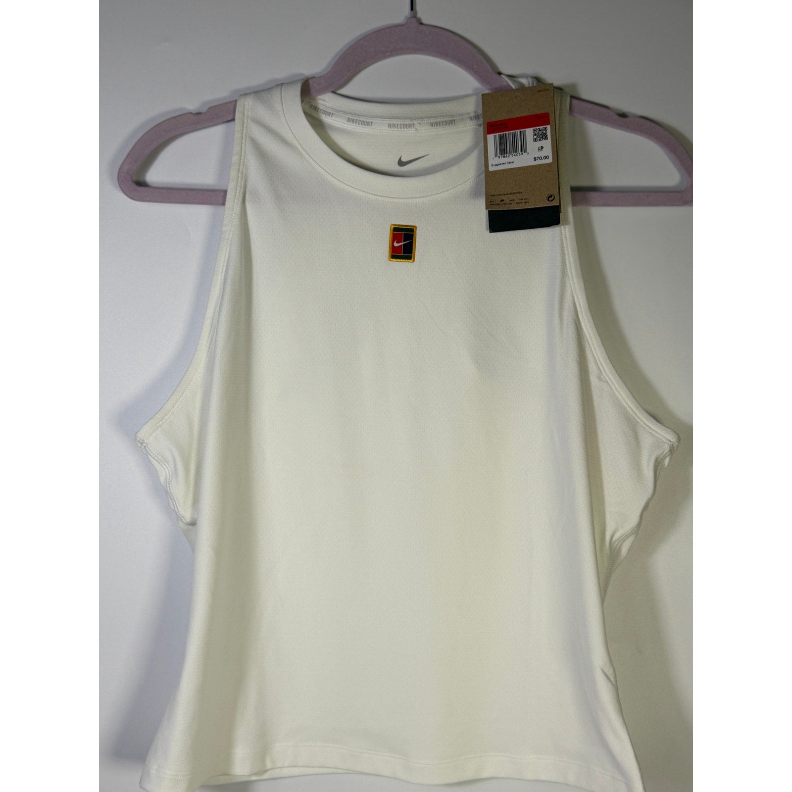 NikeCourt women's white Dri-FIT tennis tank top, size L, featuring a sleeveless design and breathable fabric for athletic performance.
