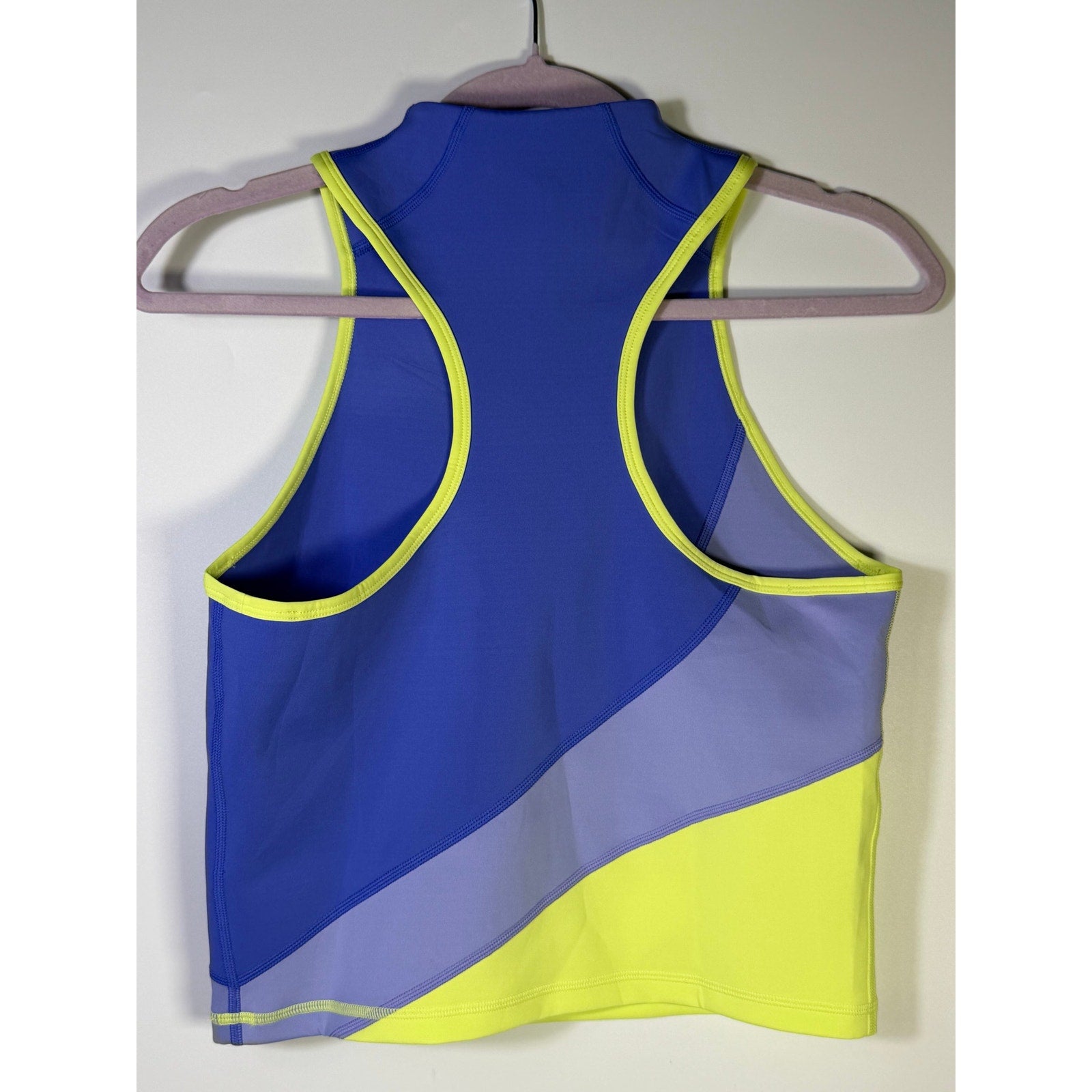 Nike women's blue and yellow quarter-zip cropped tank top, size L, designed for activewear and comfort.