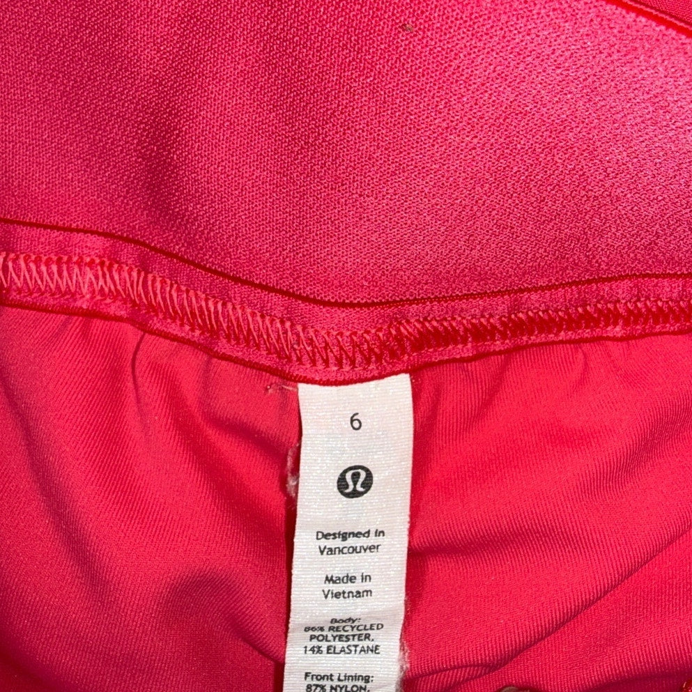 Lululemon Sonic Pink ruffle skort for women, size 6, showing the front view with ruffle detail and athletic fit.