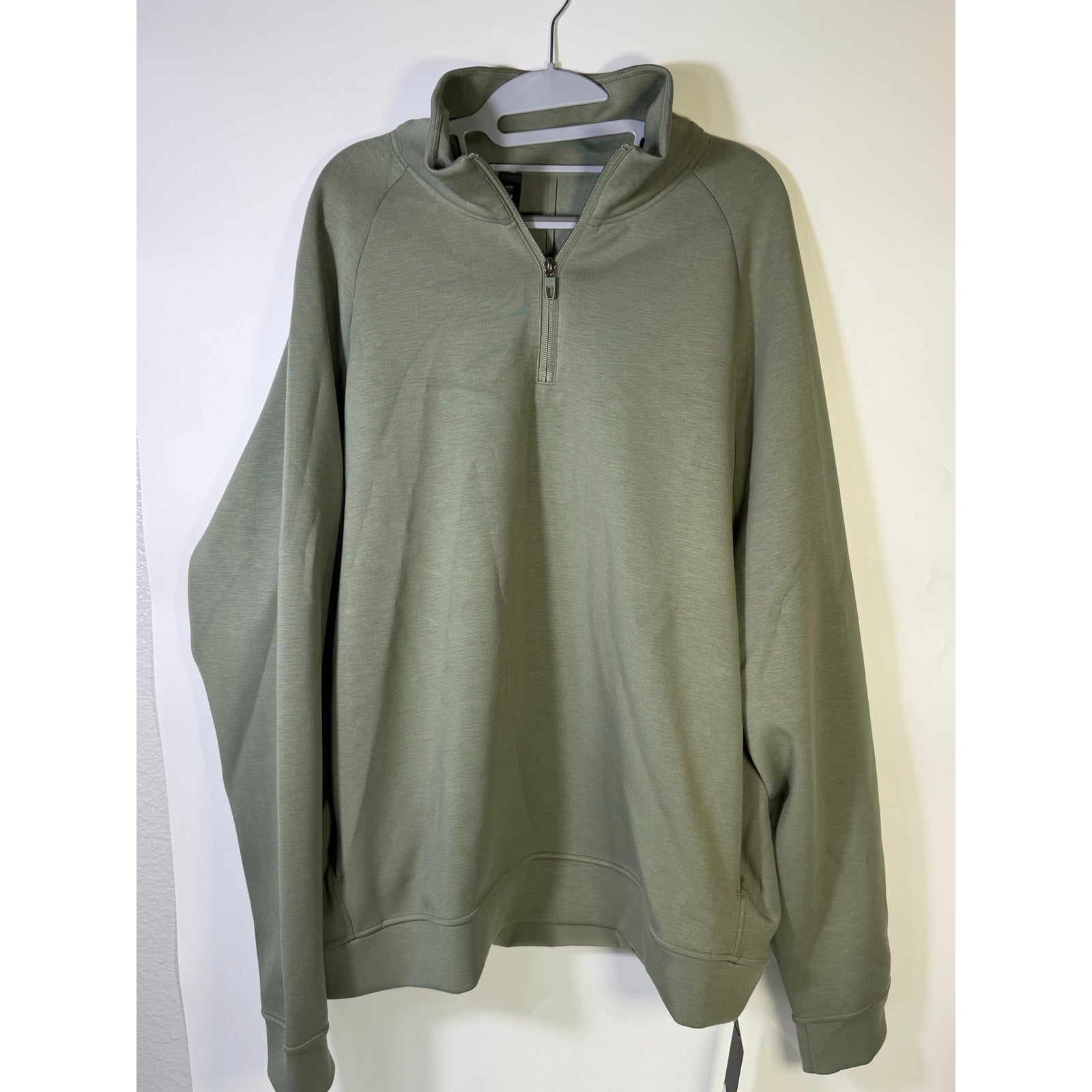 Men's Lululemon Smooth Spacer Quarter Zip sweatshirt in green, XXL size, featuring a quarter zip closure and comfortable fit.