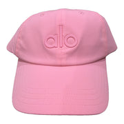 Pink Alo Yoga embossed logo baseball cap with curved brim and adjustable strap, shown on a plain background.