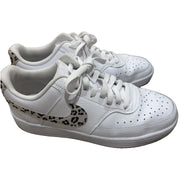 Nike Court Vision Low Leopard Swoosh white sneakers for women, size 8.5, featuring leopard print accents and classic Nike design.