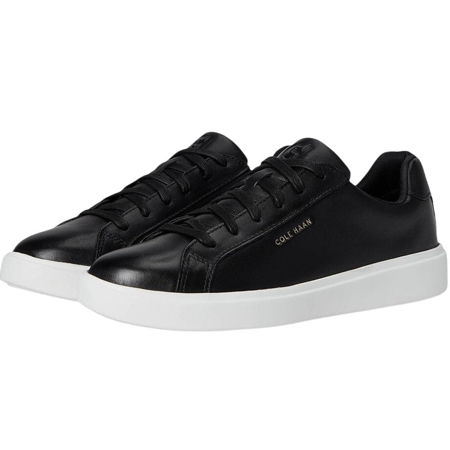 Women's Cole Haan Grand Crosscourt Daily sneaker in size 7.5B, featuring a sleek design with white and neutral tones.