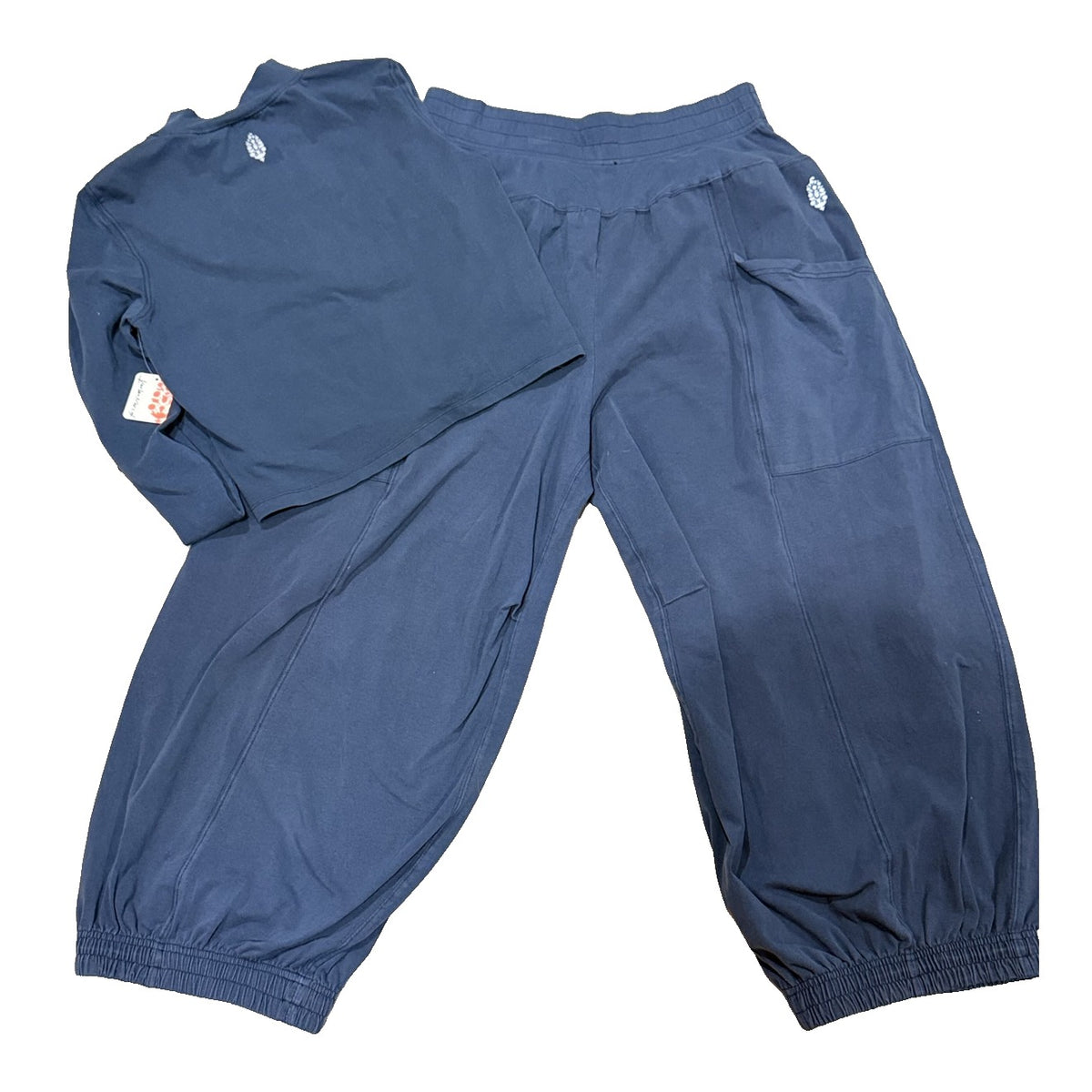 FP Movement women's XL 2-piece set with midnight navy mock neck top and jogger pants, front view, new with tags.