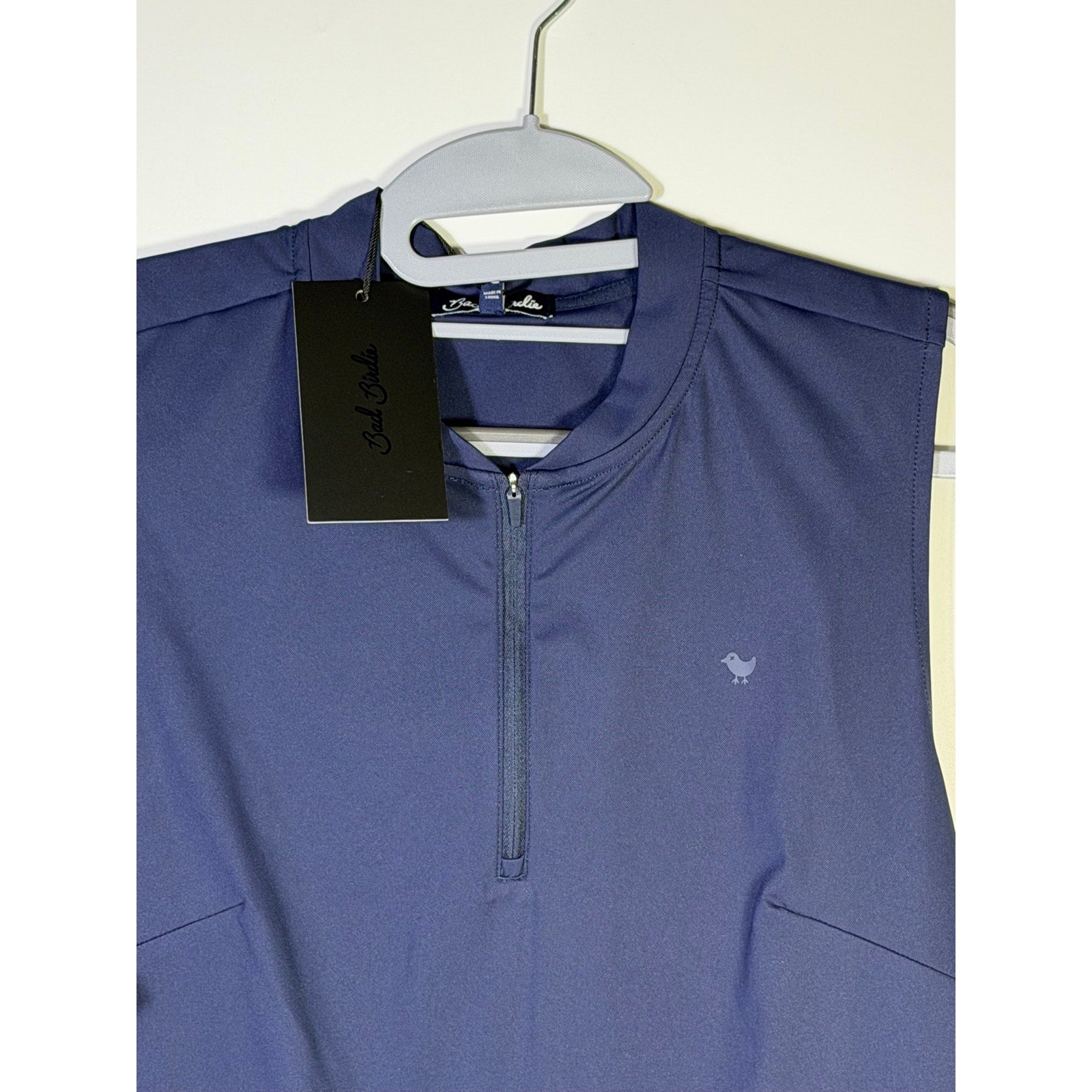Bad Birdie women’s blue sleeveless golf tank top with quarter-zip, in size XL, stylish and comfortable for athletic wear.