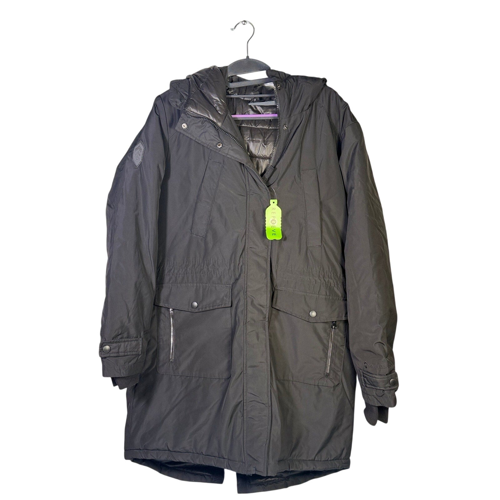 Black Free Country women's Arctic Series anorak jacket with hood, long coat style, designed for outdoor warmth and weather protection.