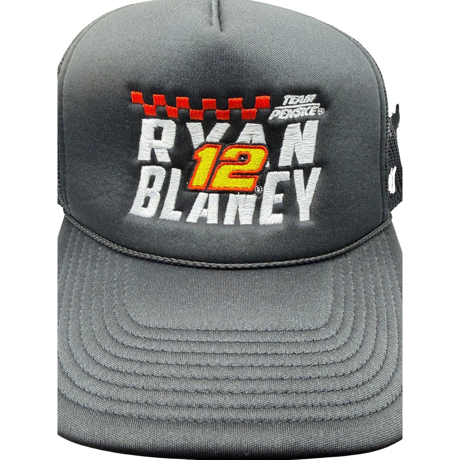 Black Ryan Blaney #12 Team Penske NASCAR ’47 trucker snapback hat with adjustable strap and embroidered logo.