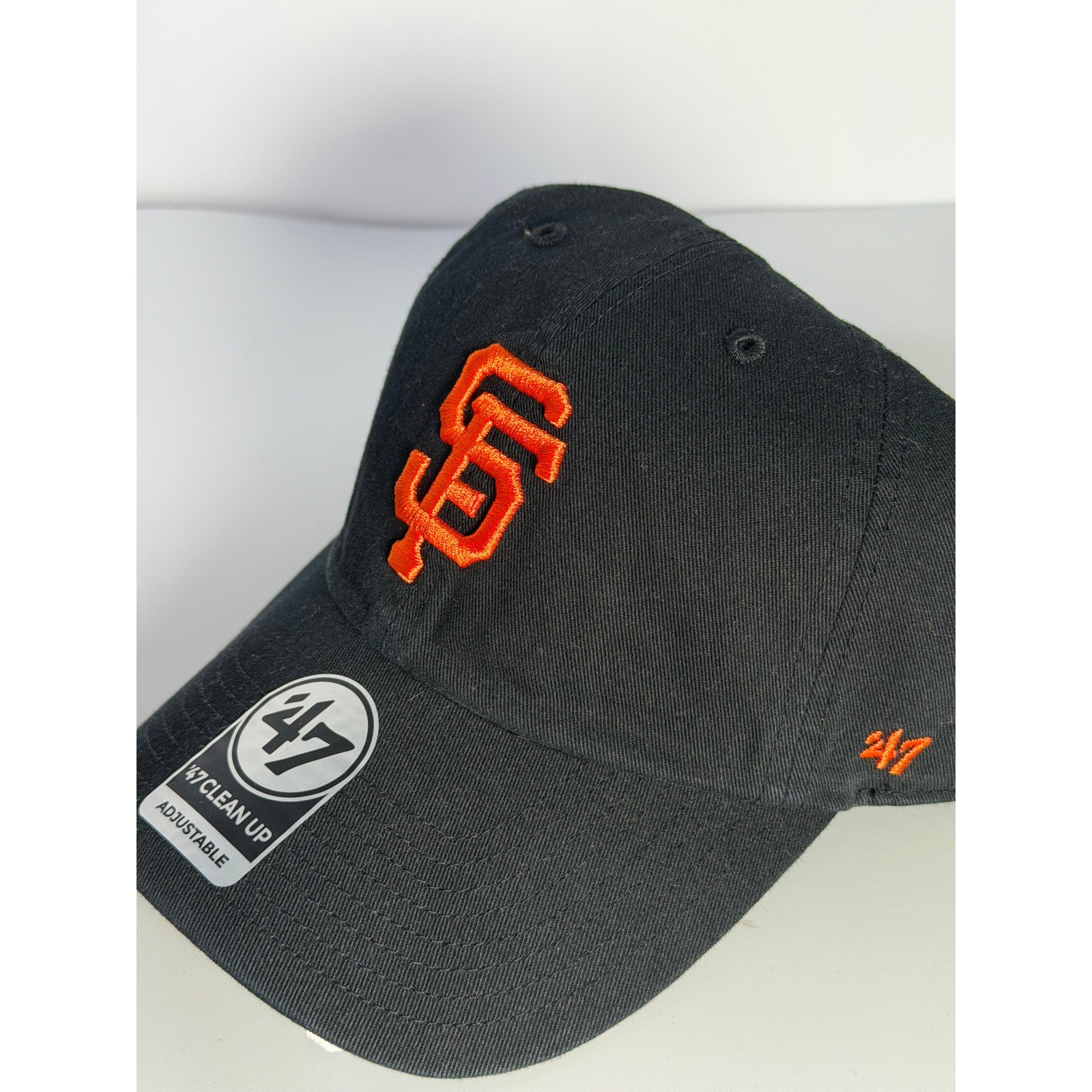 Black '47 San Francisco Giants Clean Up adjustable dad hat with curved brim and team logo embroidery.