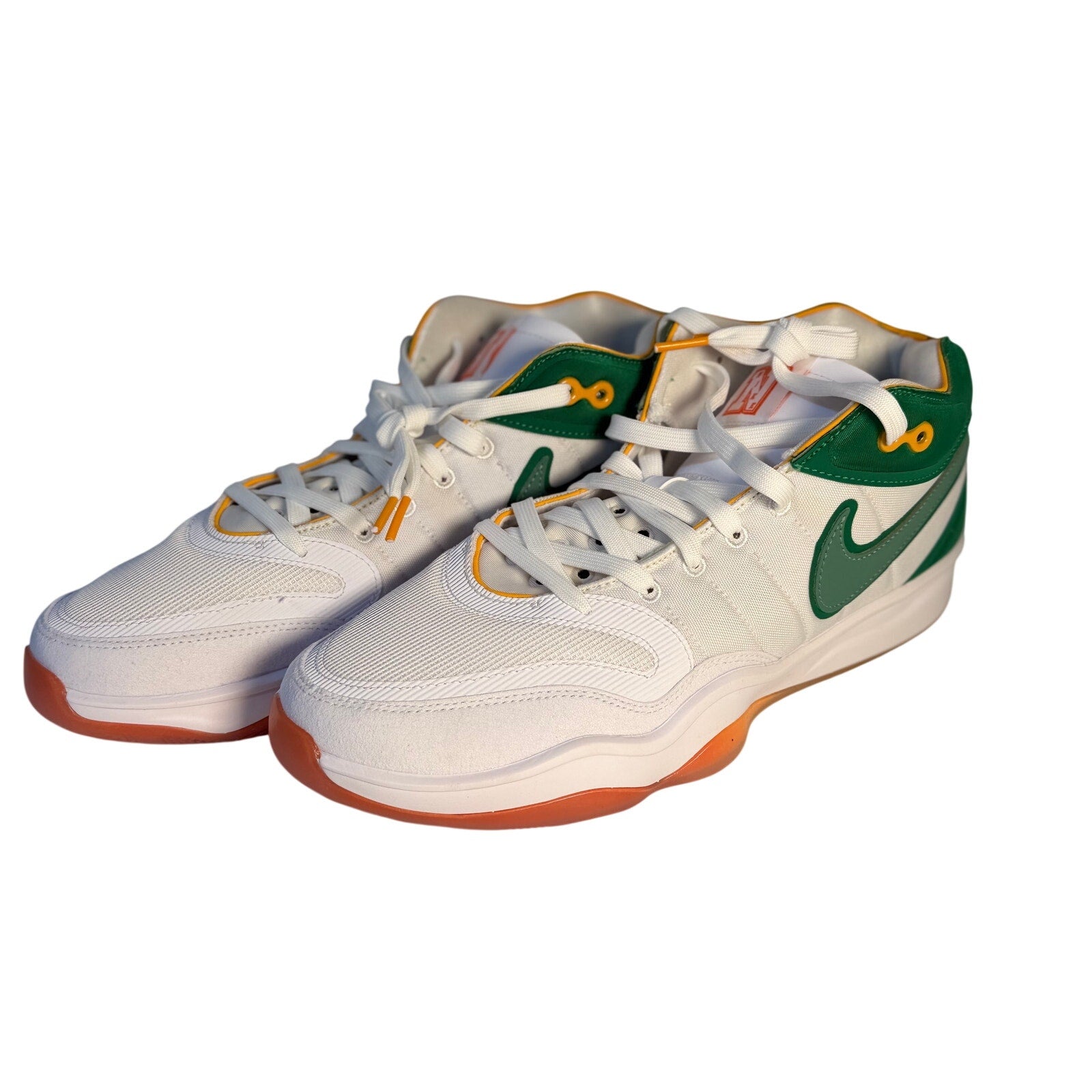 Nike men's athletic sneakers in white with green and orange accents, casual shoes in size 10.5, model DJ9405-103