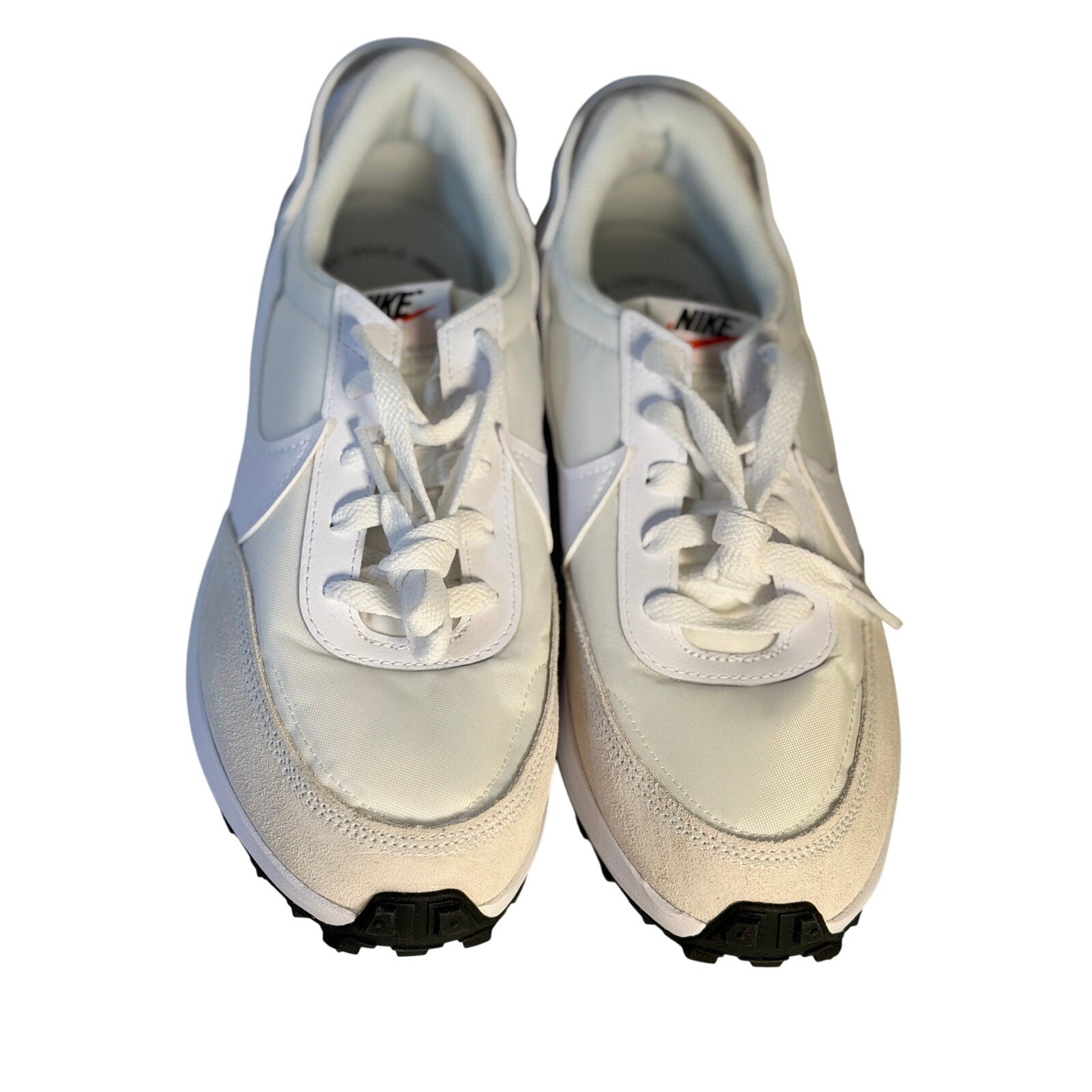 Nike Waffle Debut women's sneakers in size 9.5, featuring classic design and white and gray colorway.