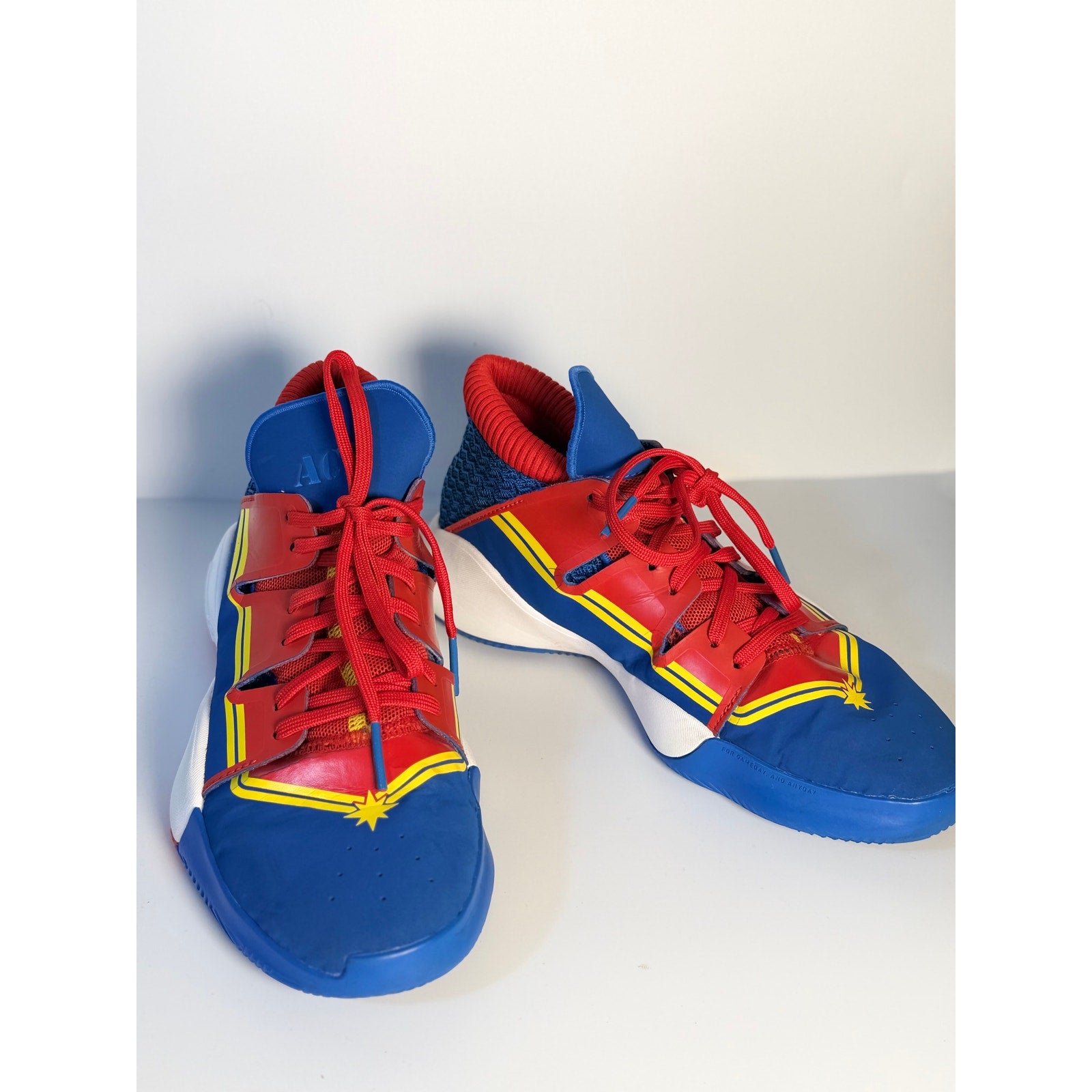 Adidas Exhibit A Captain Marvel basketball shoes in blue and red for men, US size 7, featuring athletic design and branded details.