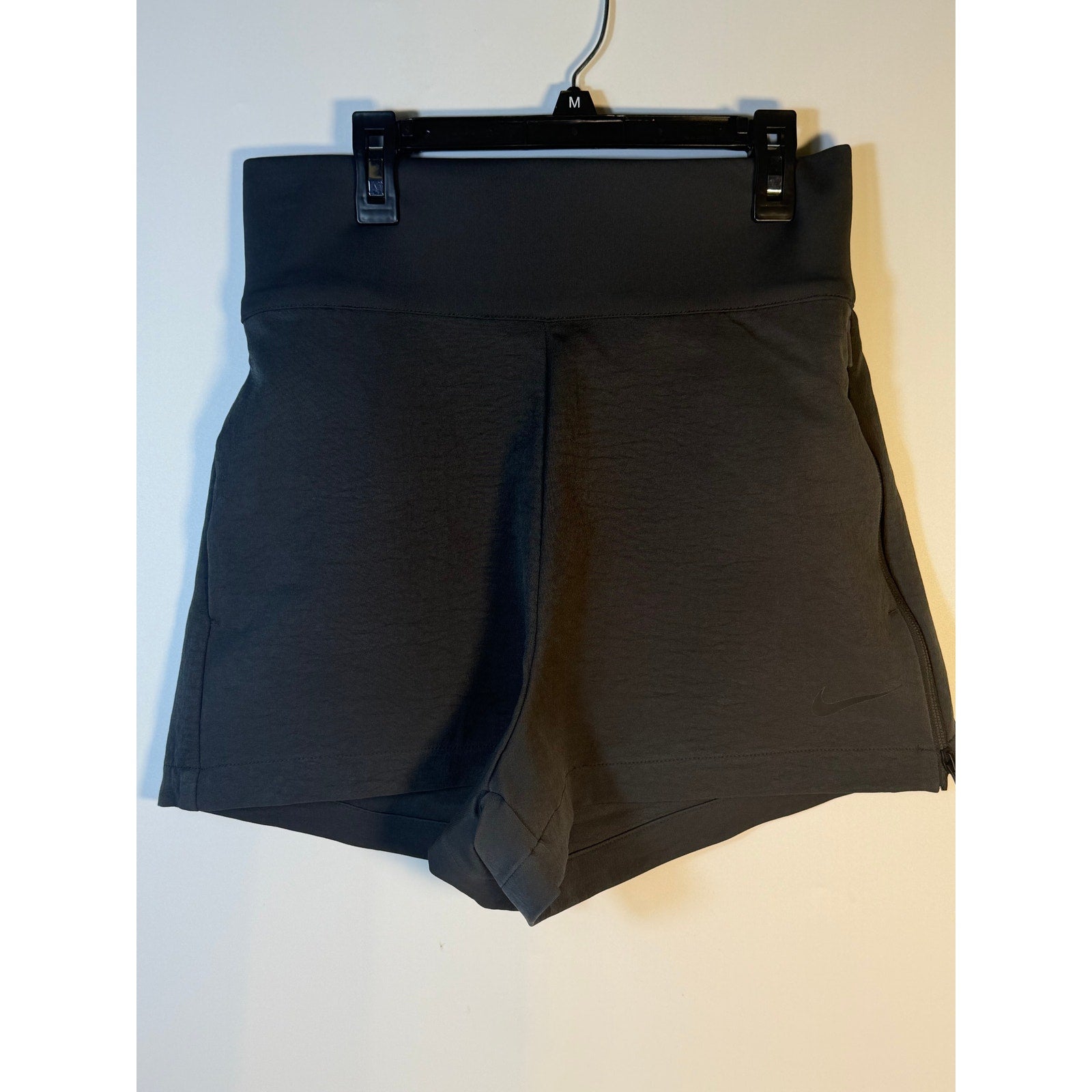 Nike Dri-FIT Flex Bliss Luxe women's shorts in gray, high-rise design, made for running and active wear.