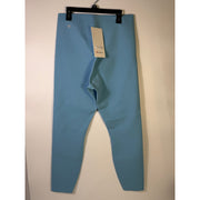 Lululemon Glow Up HR Tight 25-inch women's leggings in Windmill Blue, showcasing the fitted high-rise design and vibrant color.