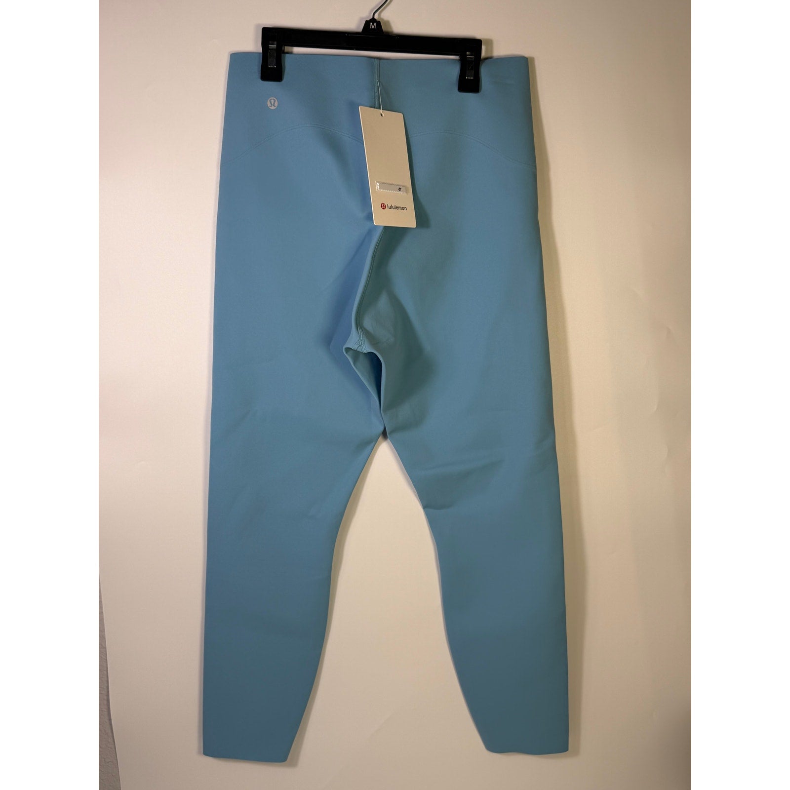 Lululemon Glow Up HR Tight 25-inch women's leggings in Windmill Blue, showcasing the fitted high-rise design and vibrant color.