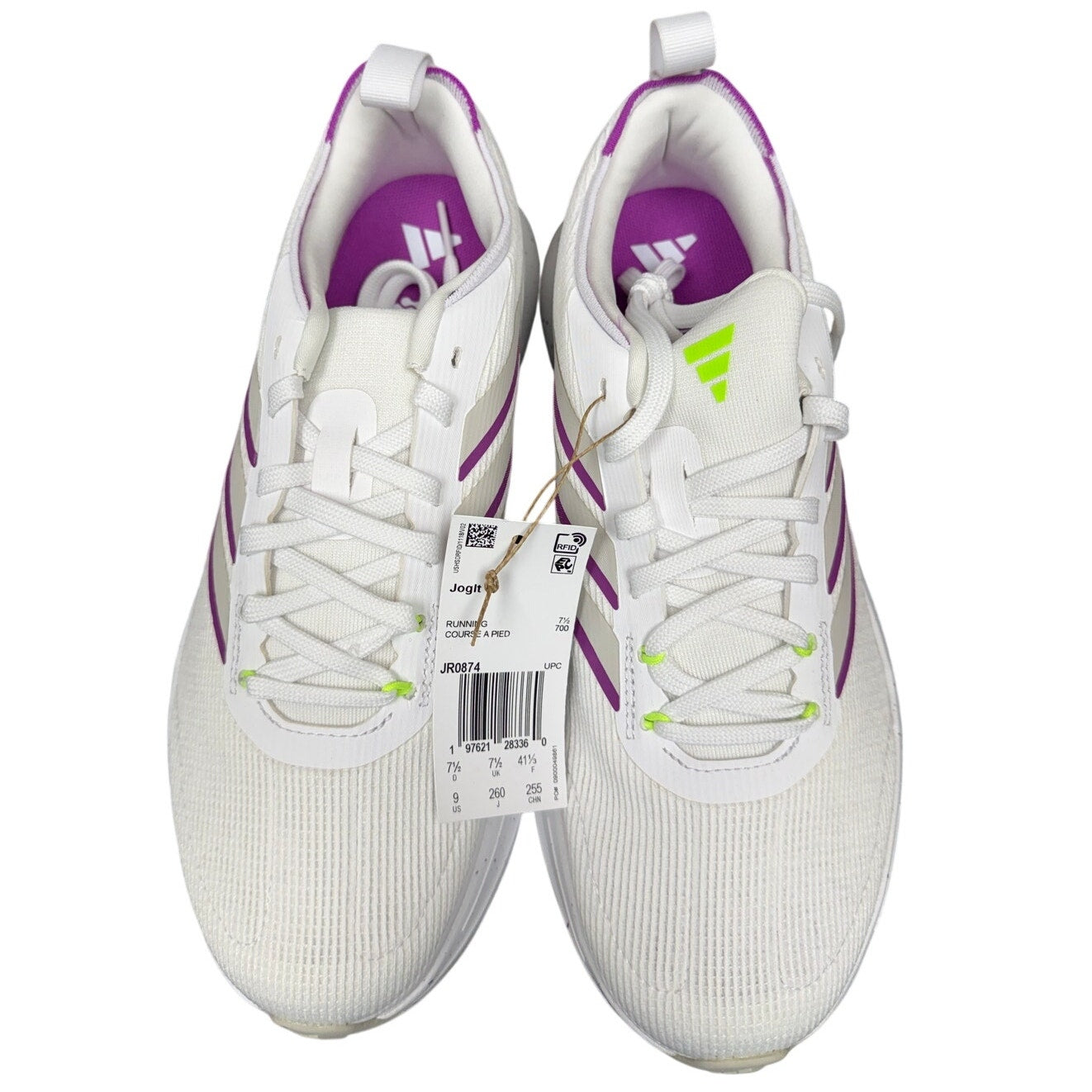 Adidas Women's Jogit running sneakers in white with breathable mesh and cushioned sole, designed for athletic walking and running.
