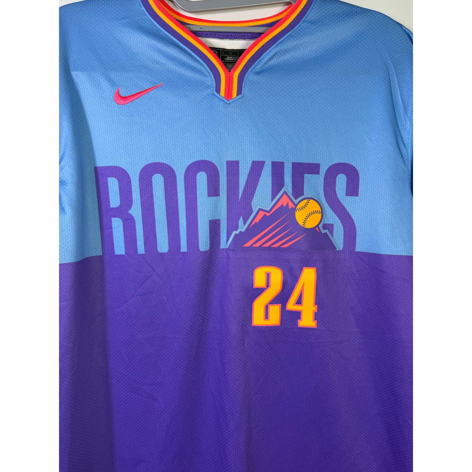 Nike Rockies McMahon #24 City Connect youth jersey in size L 14/16, new with vibrant team logo and colorful design.