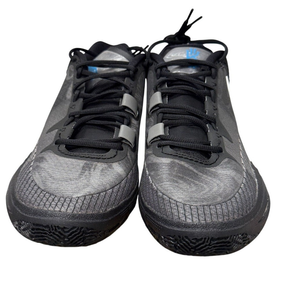 Nike Kyrie Infinity 8 basketball shoes in black and white with a sleek design, men’s size 11, featuring sporty details and Nike branding.