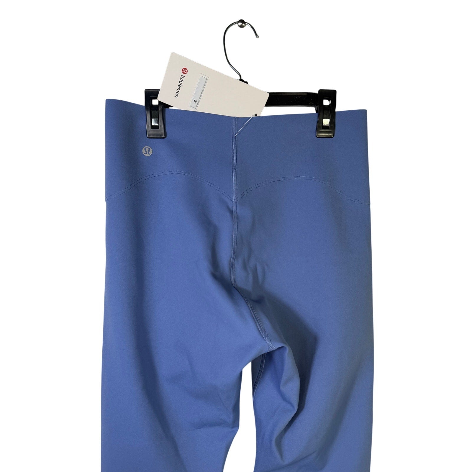 Lululemon Glow Up Super-High-Rise Tight leggings in prep blue, size 10, featuring a close-up of the fitted, high-waisted design.