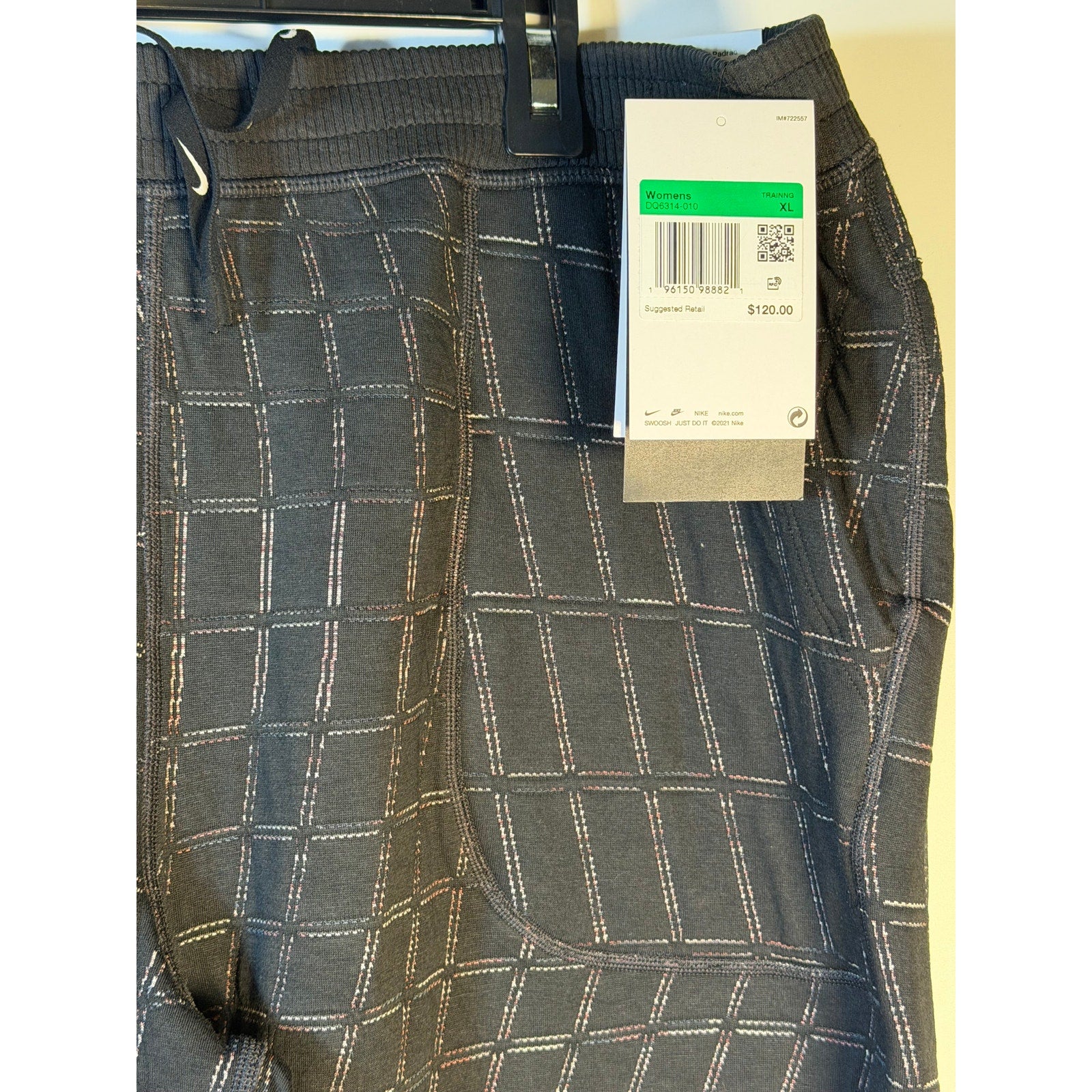 Nike Women's black Yoga Luxe Grid Print jogger pants, XL size, featuring a comfortable fit and stylish athletic design.