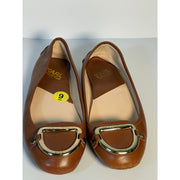 Pre-owned Karl Lagerfeld Paris women's brown ballet flats with gold logo hardware, US size 9, featuring a sleek, classic design.