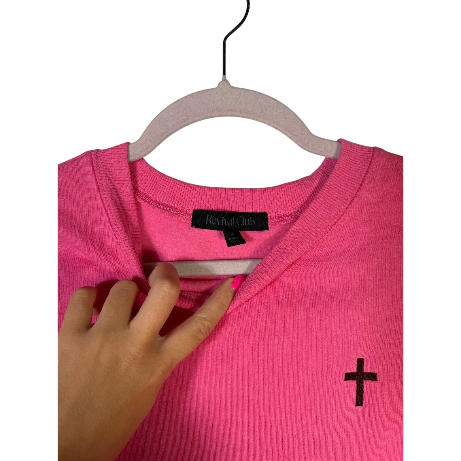 Revival Club pink Christian crewneck sweatshirt with "Jesus Loves You" text, size small, casual sweatshirt for women.