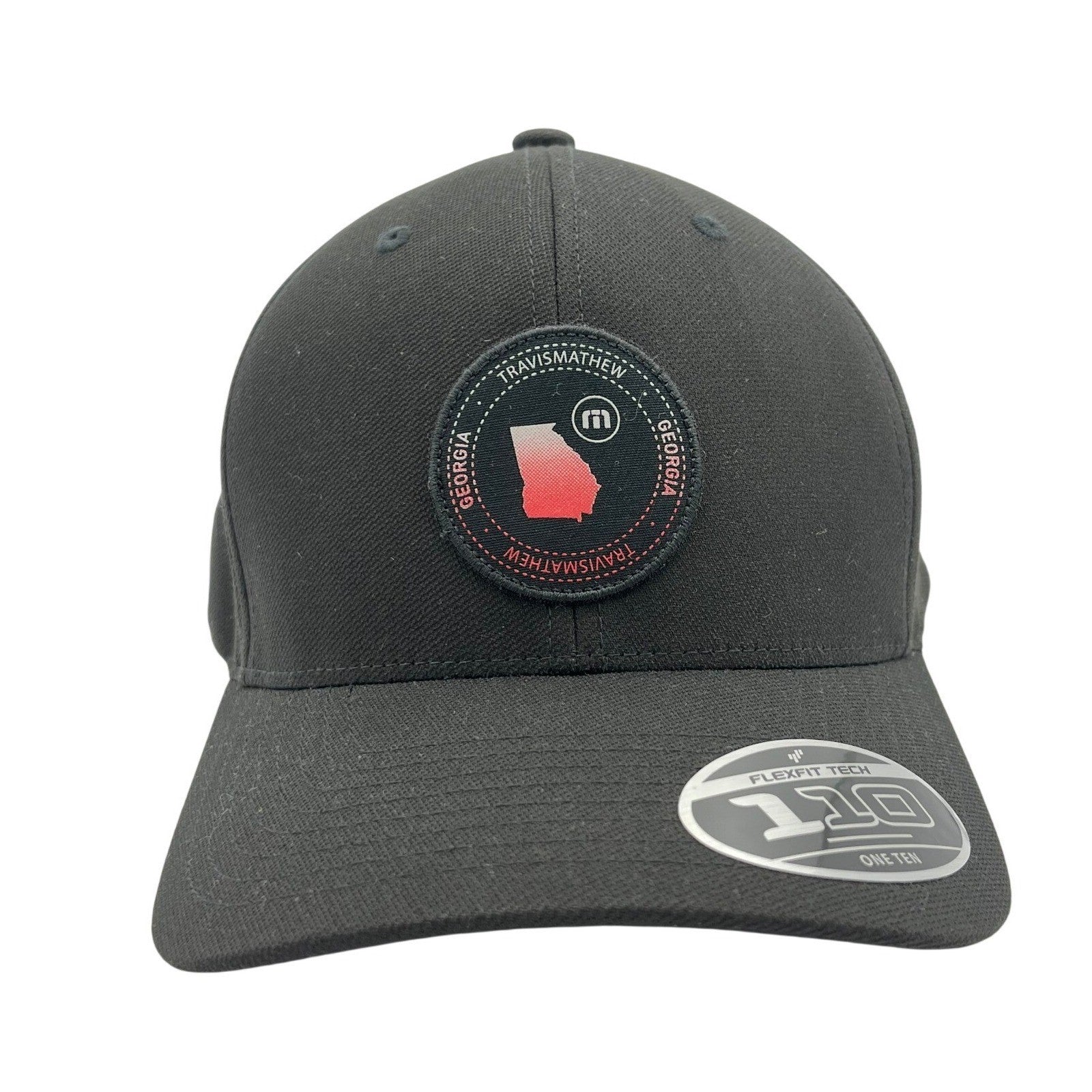 TravisMathew Georgia FlexFit Tech 110 performance golf hat displayed on a head mannequin, showcasing its structured design.